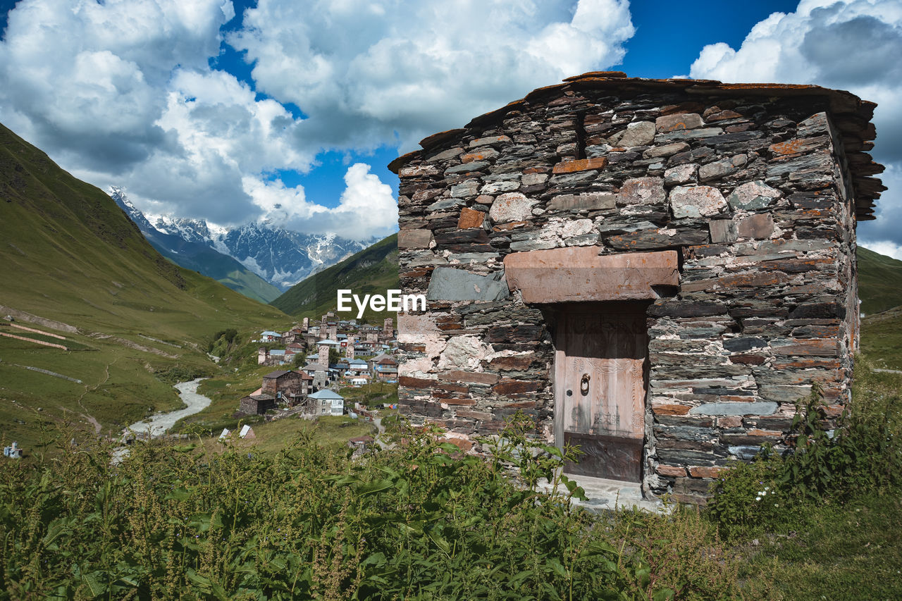 PANORAMIC SHOT OF BUILDING AGAINST SKY