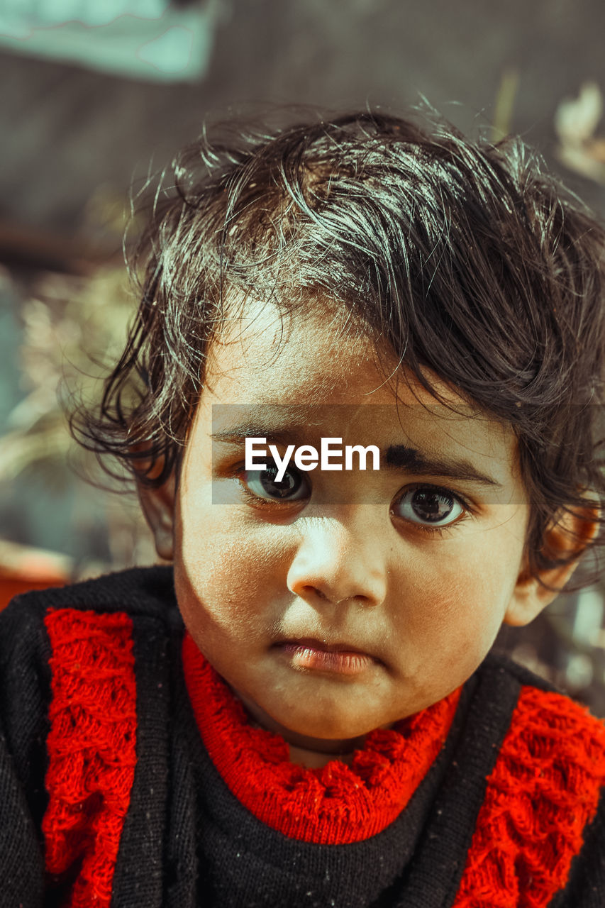 Close-up portrait of cute boy