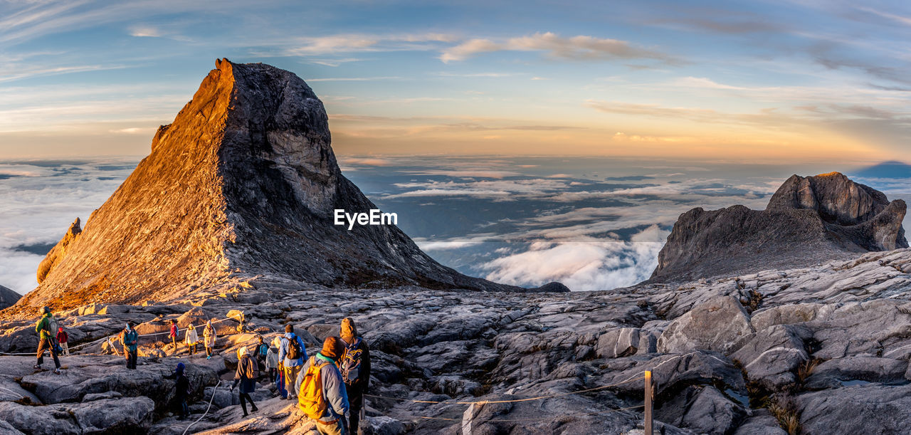 Scenic view of snow mountains against sky during sunset