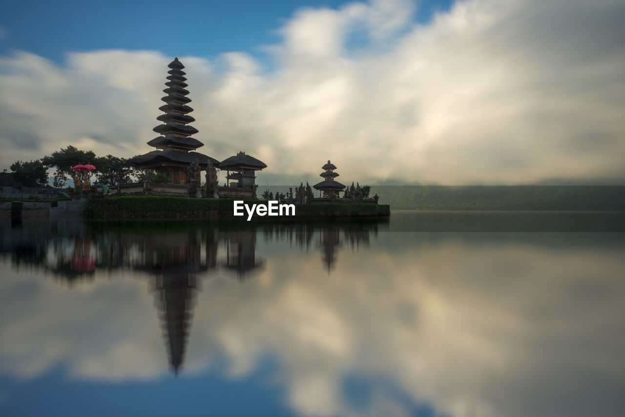 REFLECTION OF BUILDINGS IN LAKE