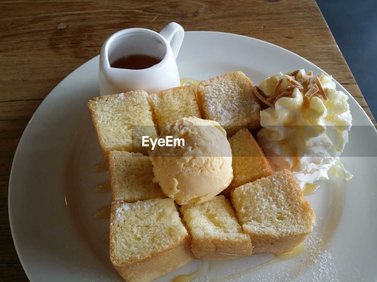 High angle view of toasted break with ice cream in plate