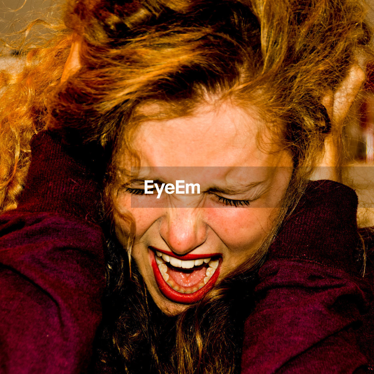 Close-up of young woman scream