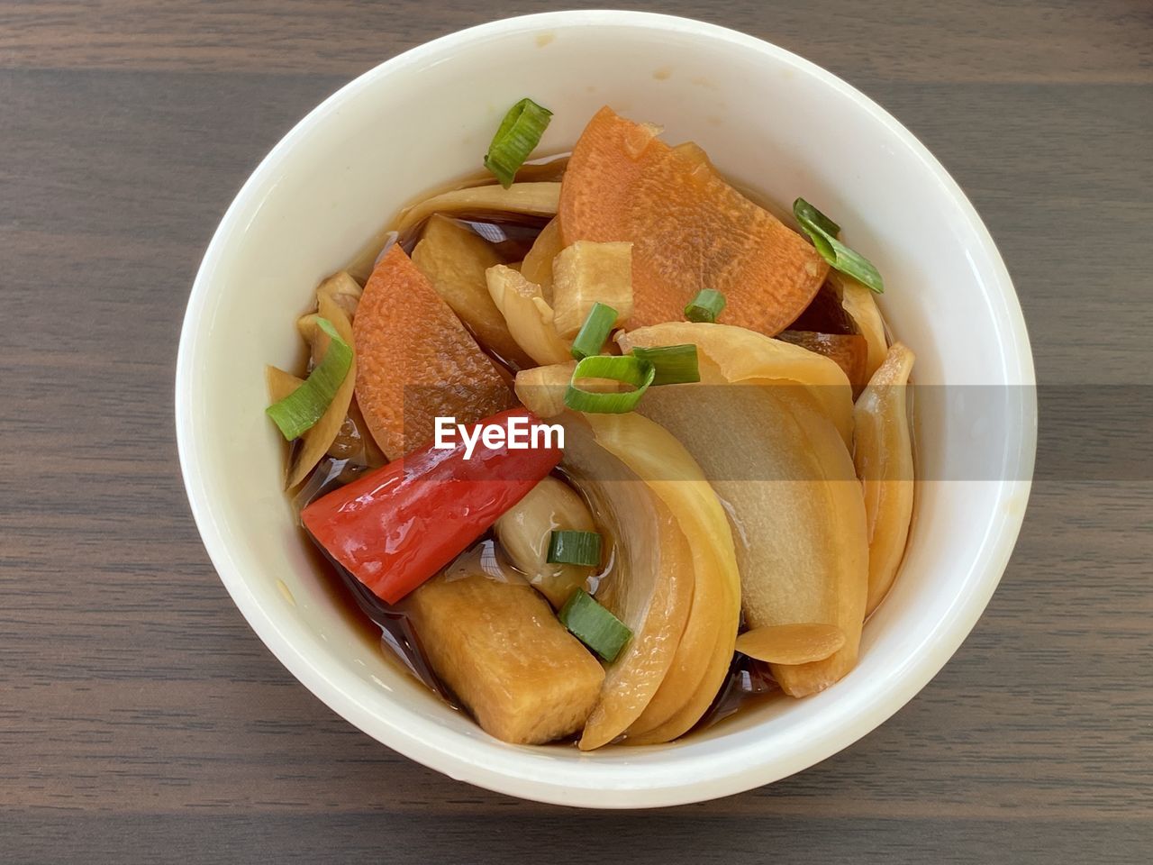High angle view of korean onion pickles in bowl on table