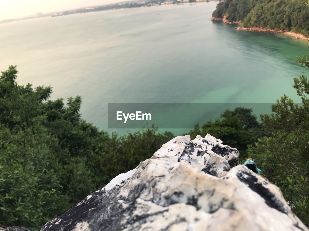 SCENIC VIEW OF ROCKS IN LAKE