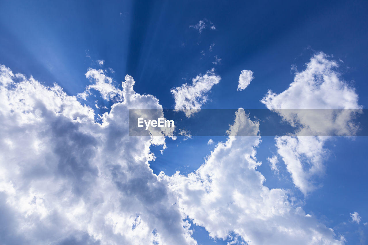 LOW ANGLE VIEW OF WHITE CLOUDS IN SKY