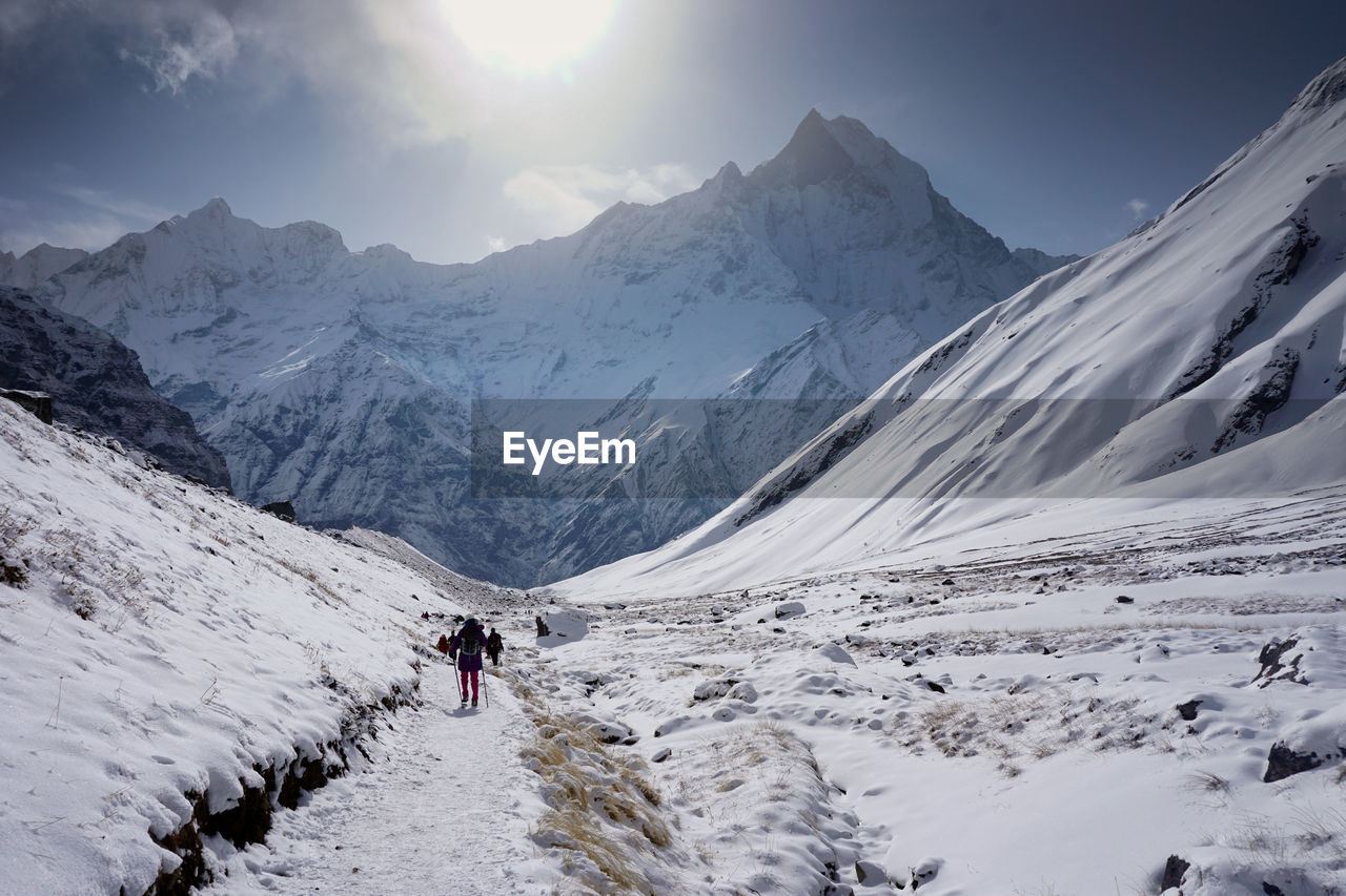 Scenic view of snowcapped mountains against sky