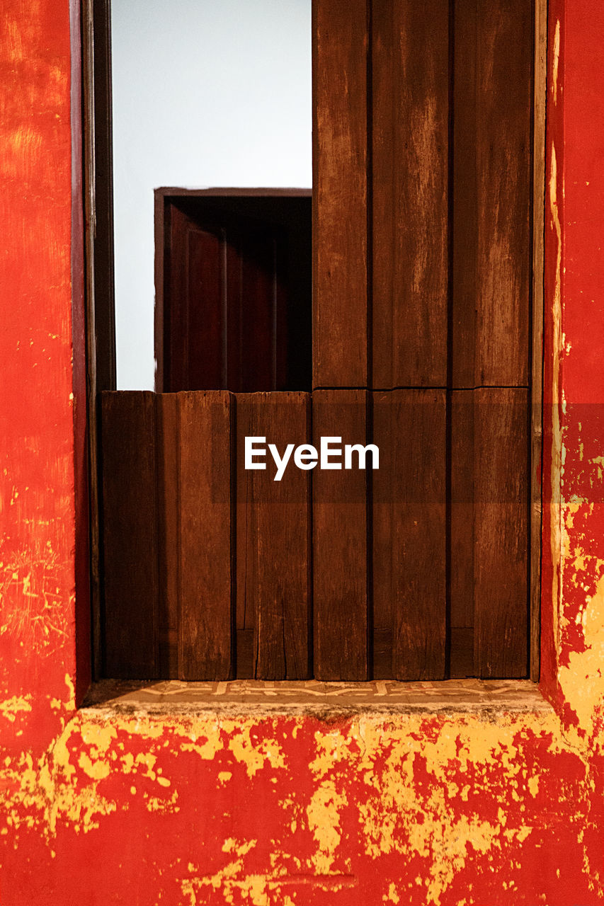 Window in red wall , baracoa - cuba