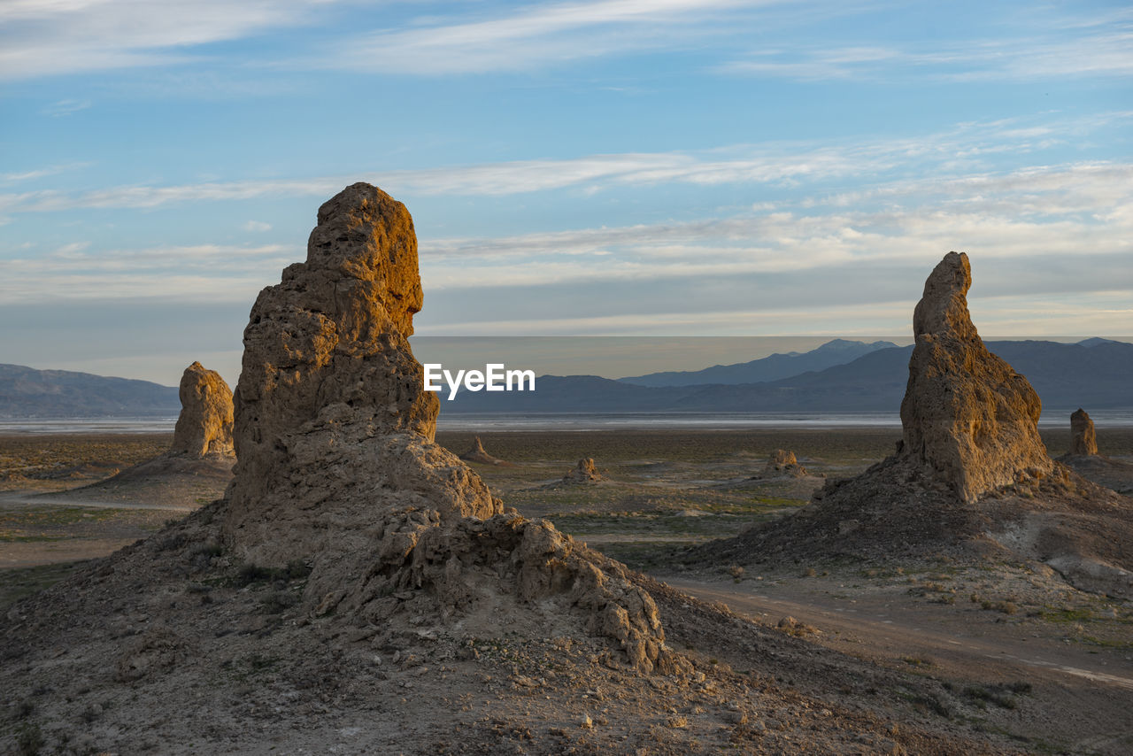 Trona pillars during sunrise against blue sky