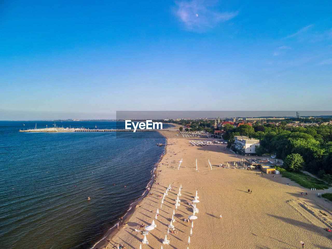 High angle view of beach against blue sky, aerial view on the pier and in sopot, poland,