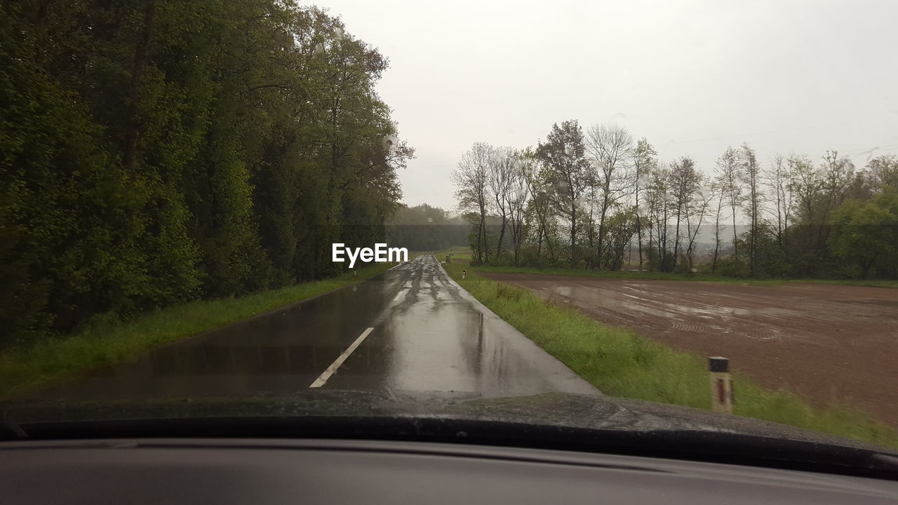 ROAD PASSING THROUGH LANDSCAPE