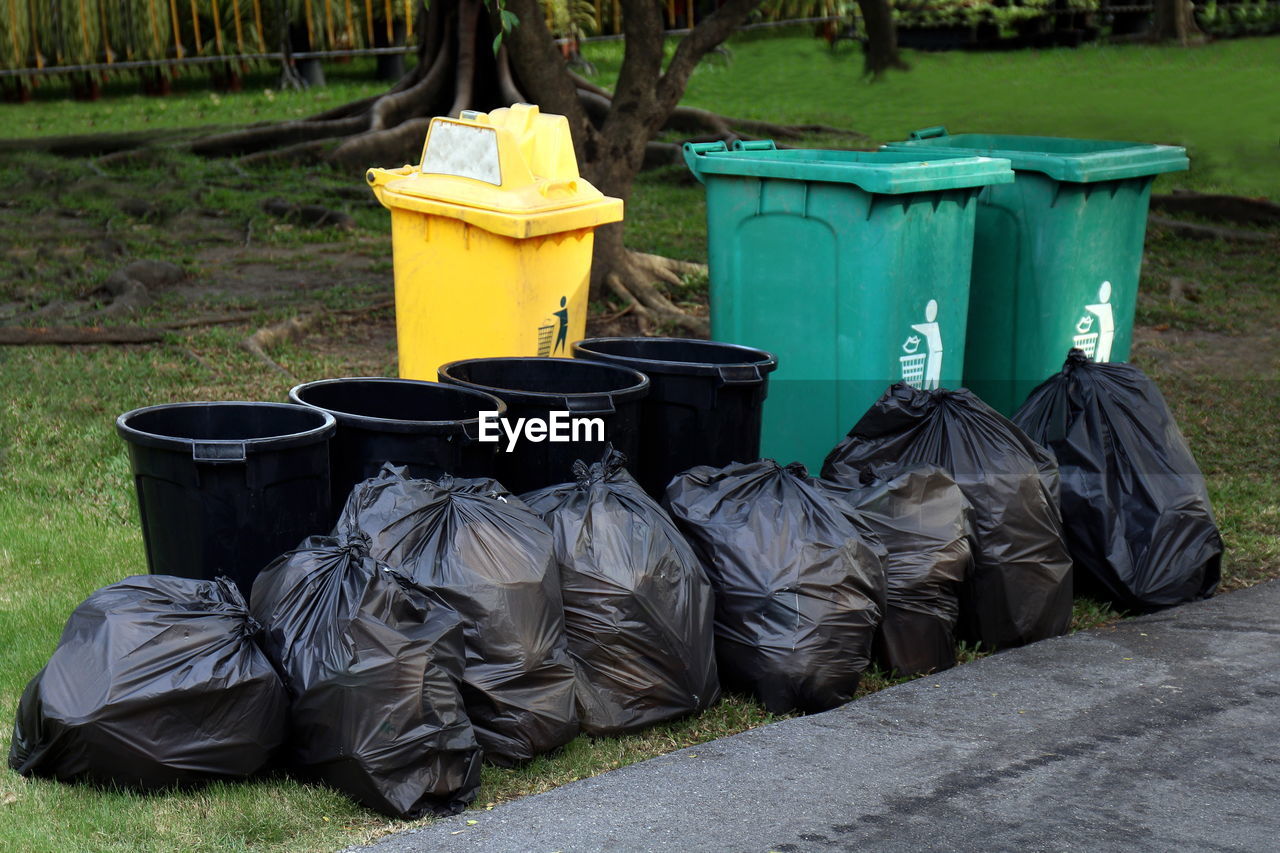 Close-up of garbage on road in city