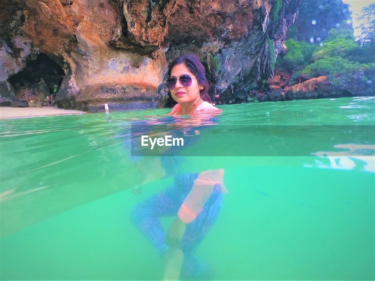 WOMAN SWIMMING IN POOL