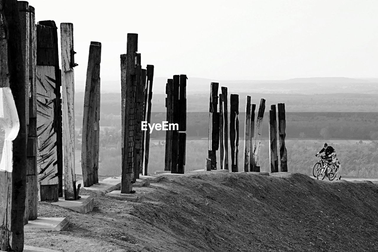Wooden posts in the dark