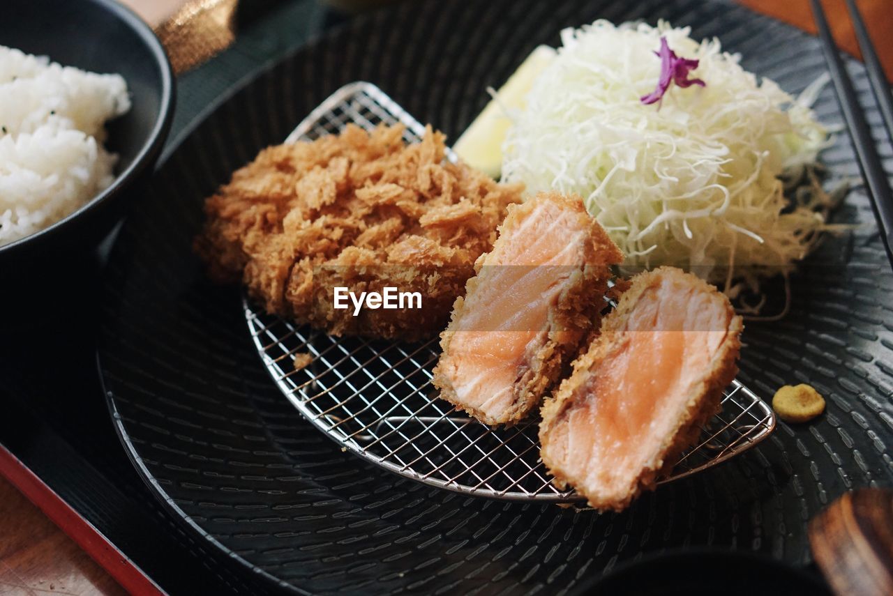 High angle view of meat in plate on table