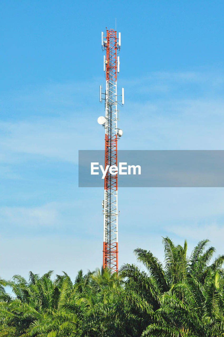 Close-up of tower against blue sky