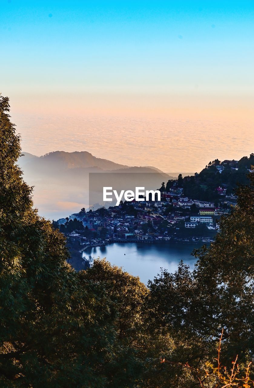 High angle view of trees against sky during sunset