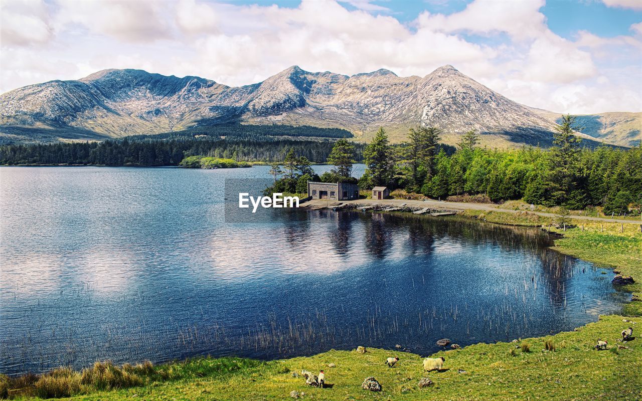 Landscape scenery with lake house and mountains in the background at lough inagh  galway, ireland