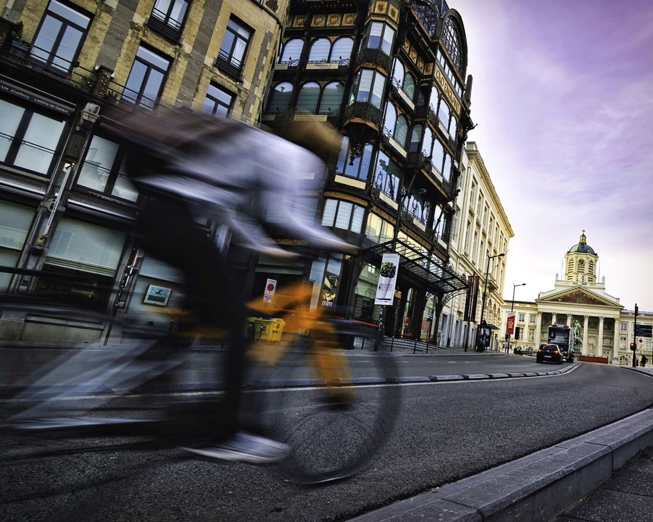 Man riding bicycle on street