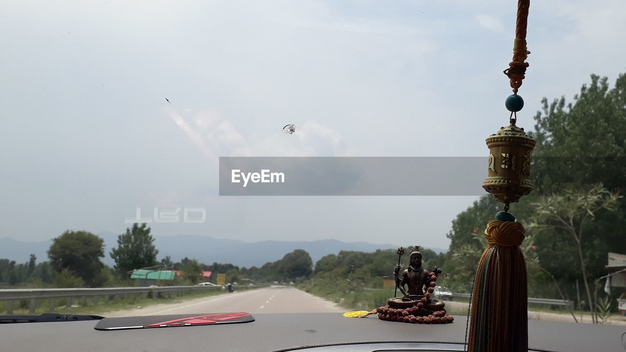 PANORAMIC VIEW OF TRAFFIC AND ROAD