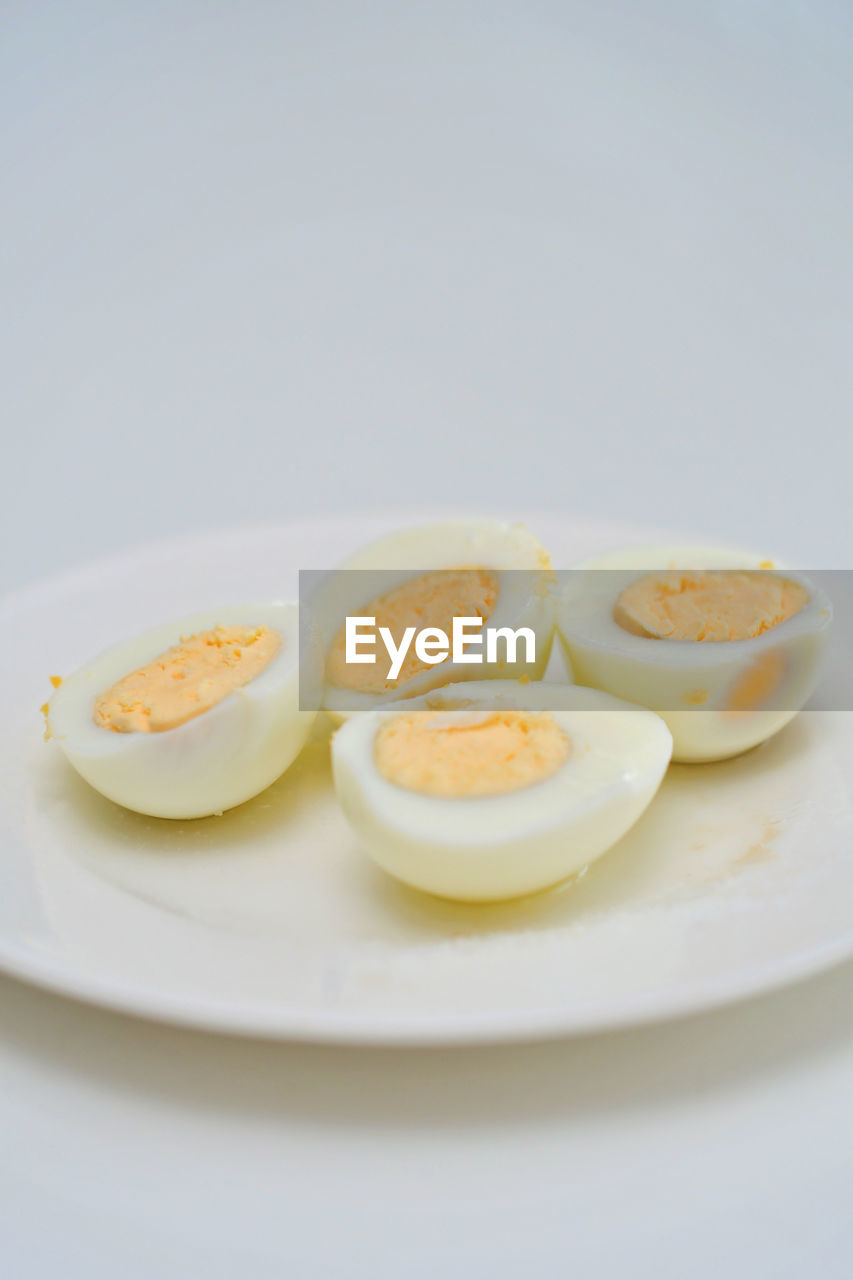 egg, food and drink, food, healthy eating, freshness, plate, studio shot, wellbeing, breakfast, indoors, no people, dish, meal, produce, close-up, egg yolk, simplicity, white background, boiled, still life