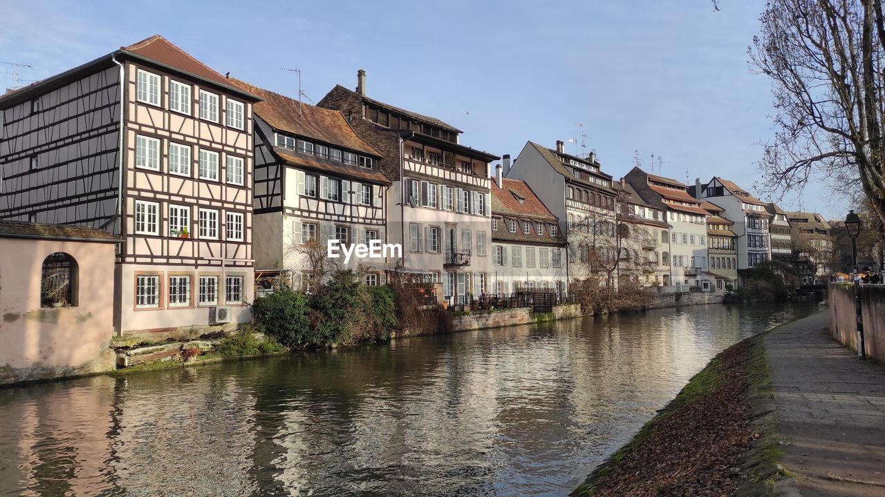 canal amidst buildings