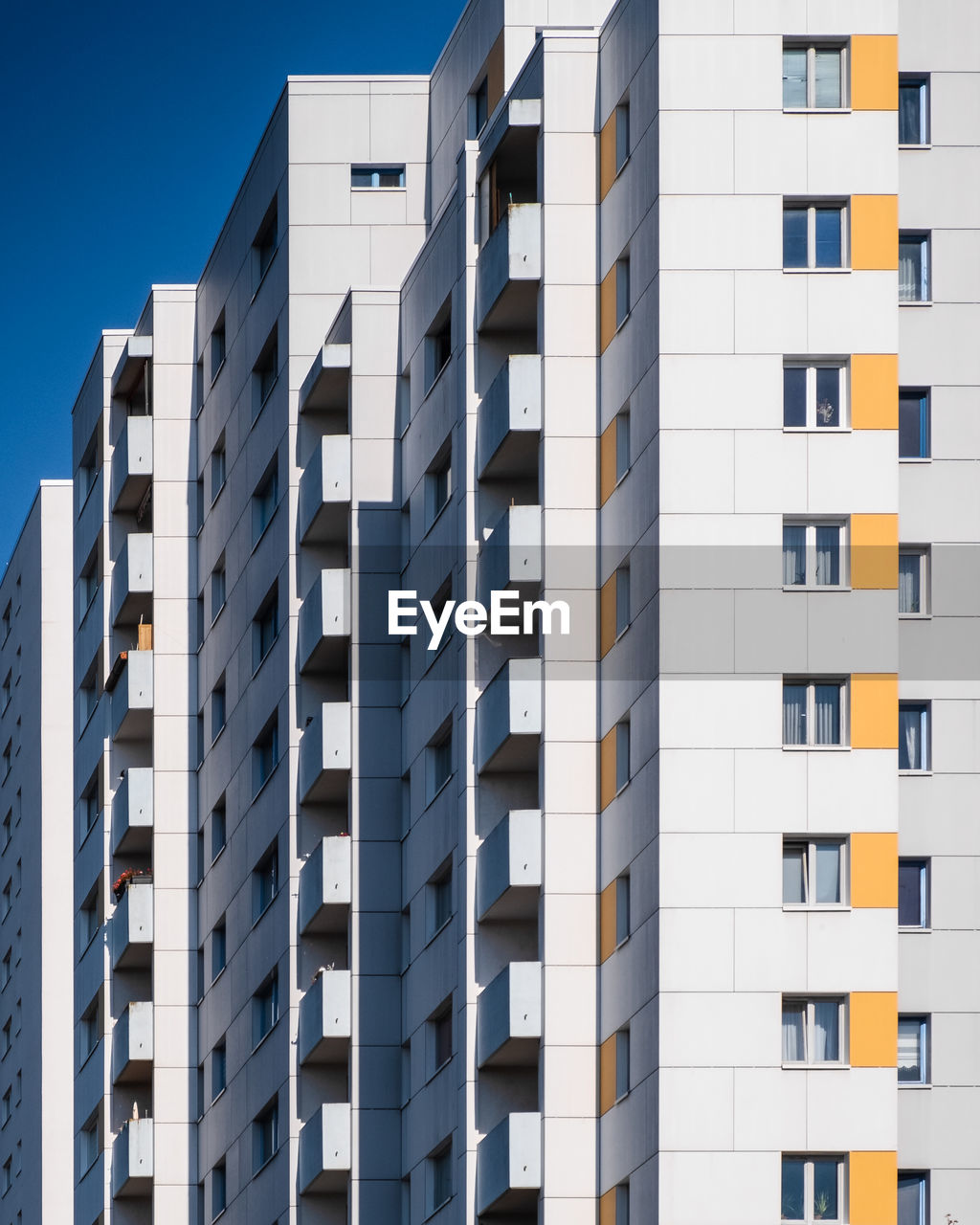 Low angle view of modern building against clear sky