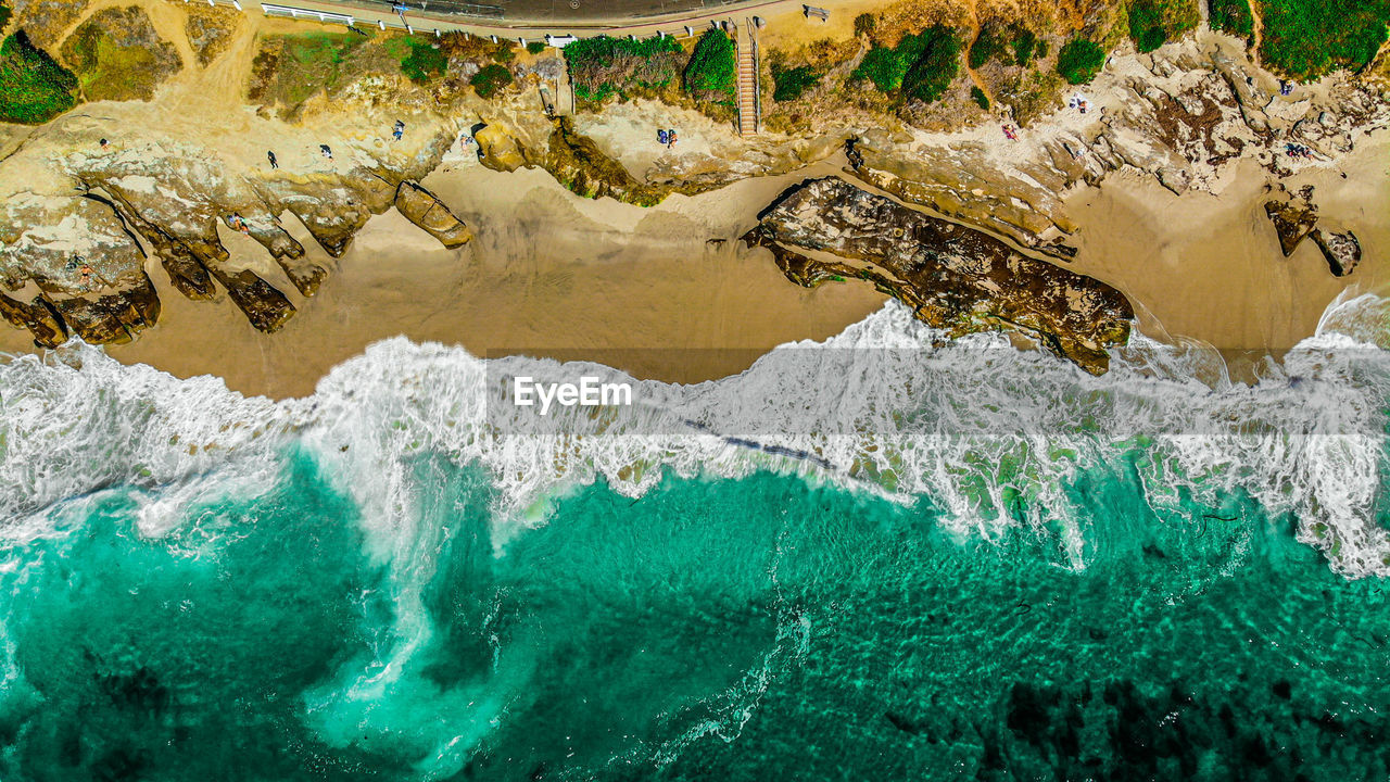 High angle view of rocks in sea