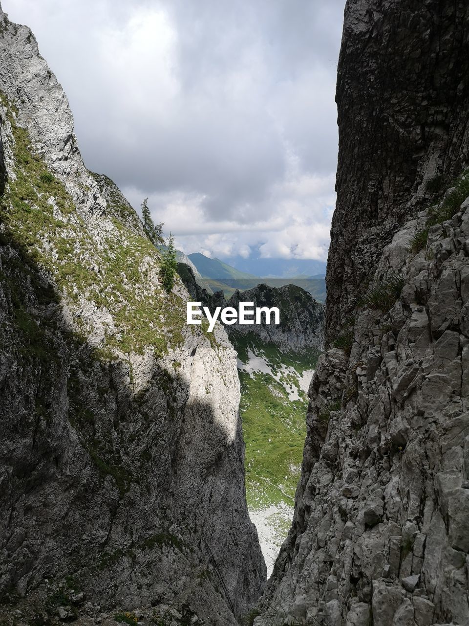 SCENIC VIEW OF ROCKS AGAINST SKY