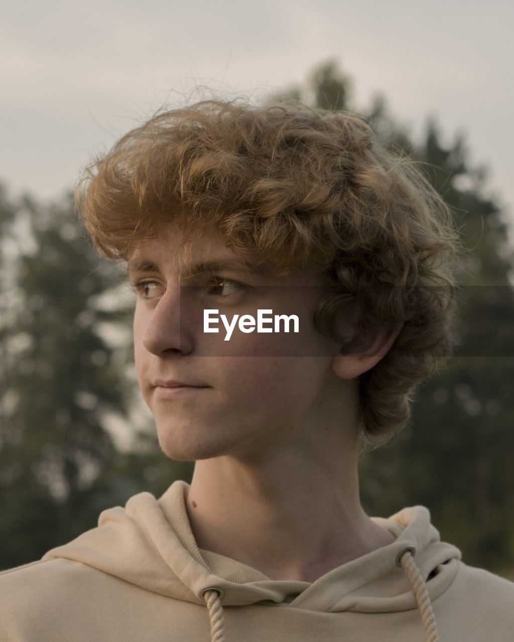 Close-up of young man looking away