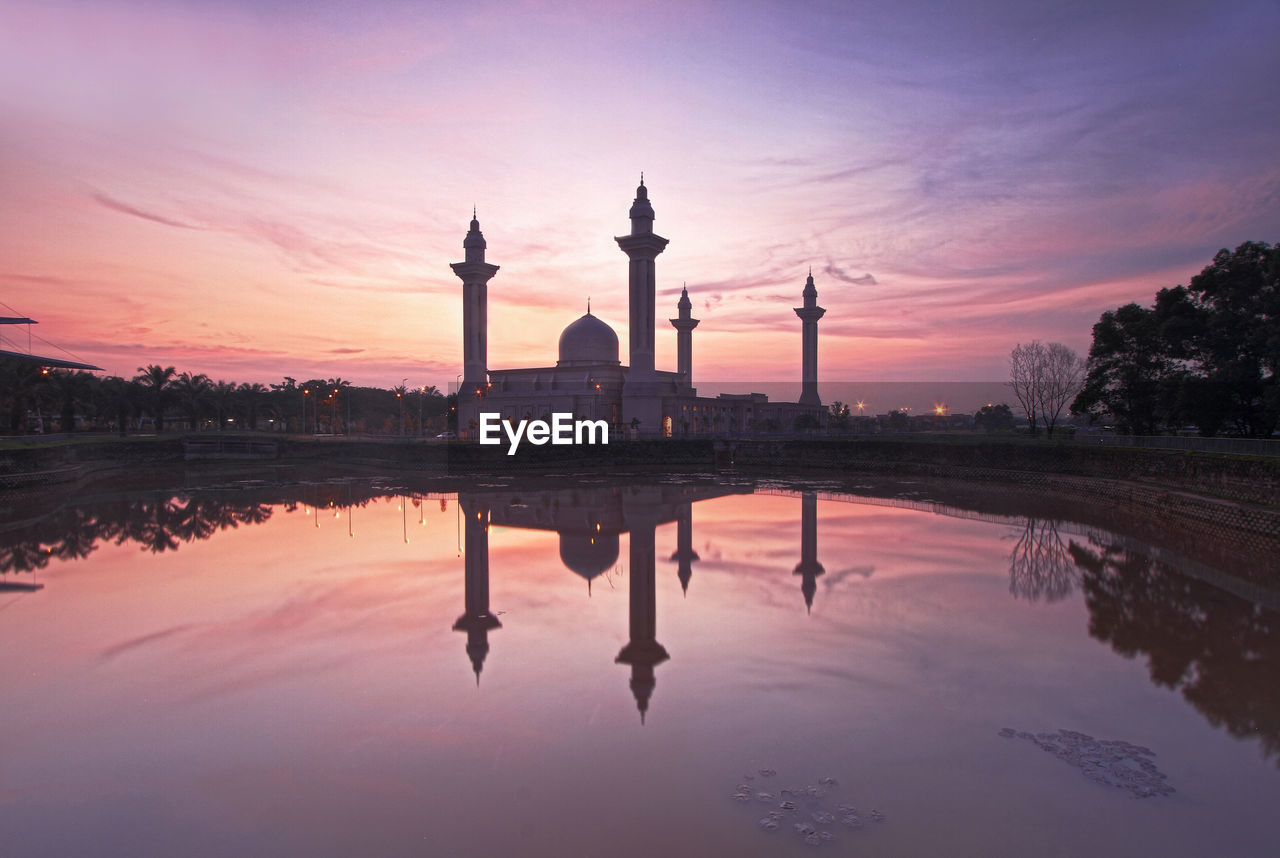 REFLECTION OF BUILDINGS IN WATER