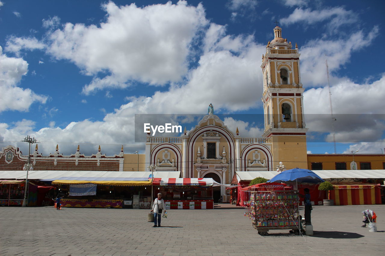 CHURCH AGAINST CLOUDY SKY