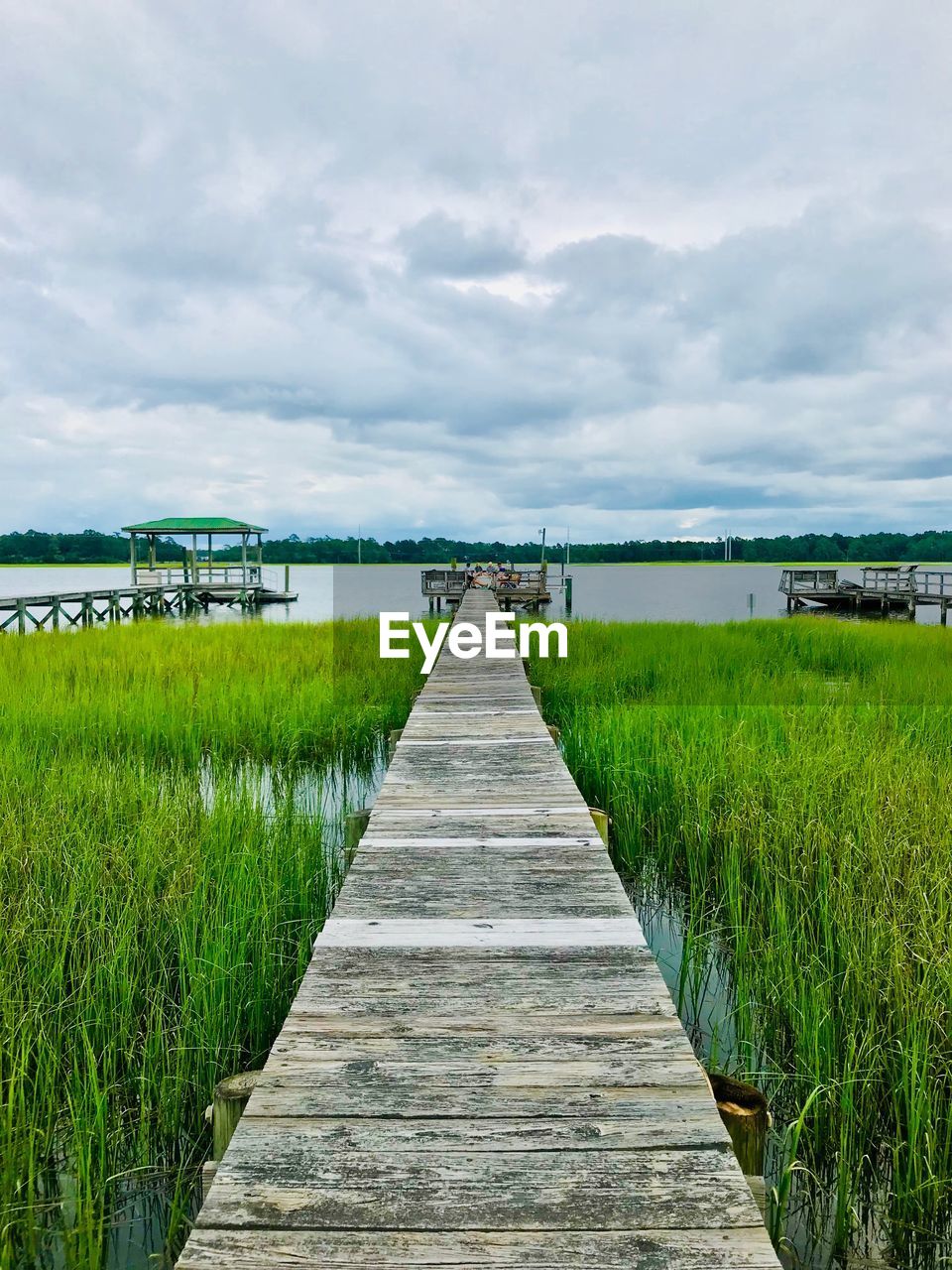 VIEW OF PIER LEADING TOWARDS SEA