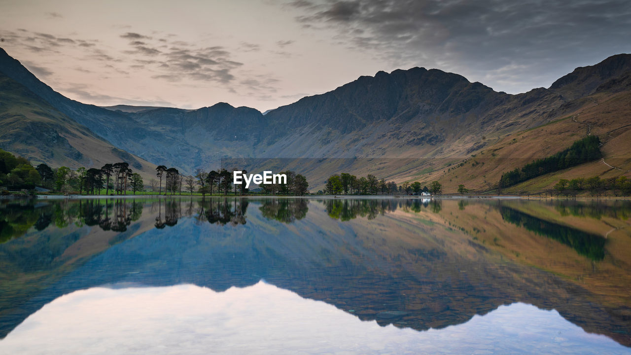 Reflections on buttermere lake at dawn