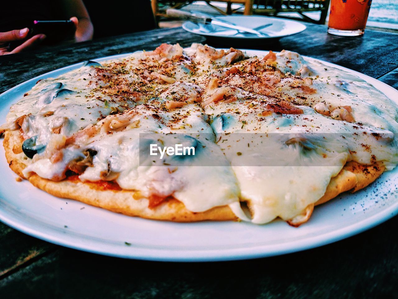 Close-up of pizza in plate on table
