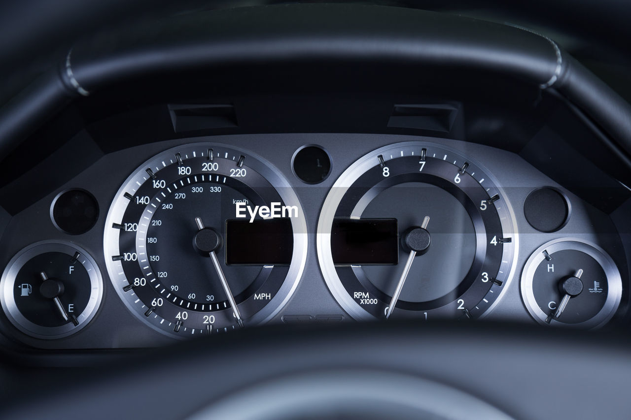 CLOSE-UP OF VINTAGE CAR ON MIRROR