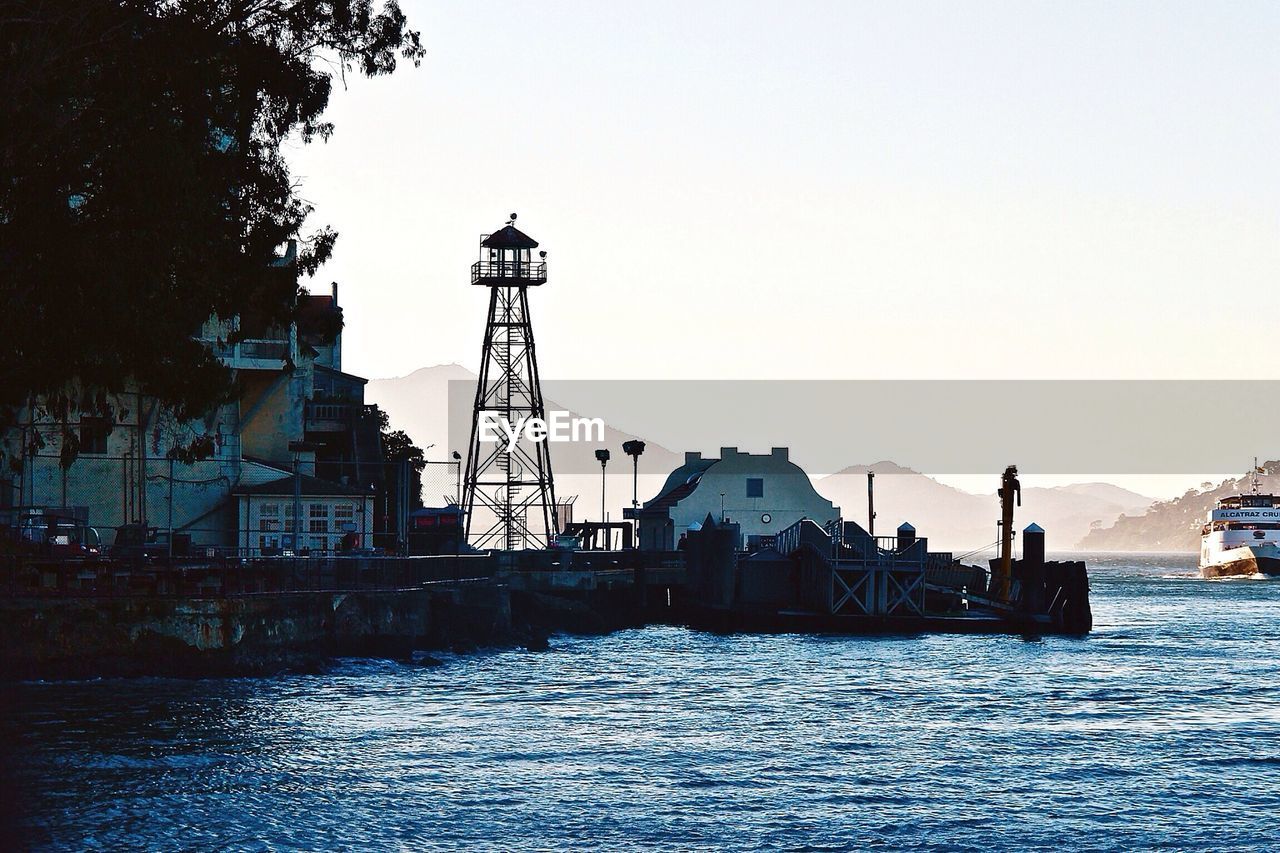 VIEW OF BUILT STRUCTURES WITH WATERFRONT