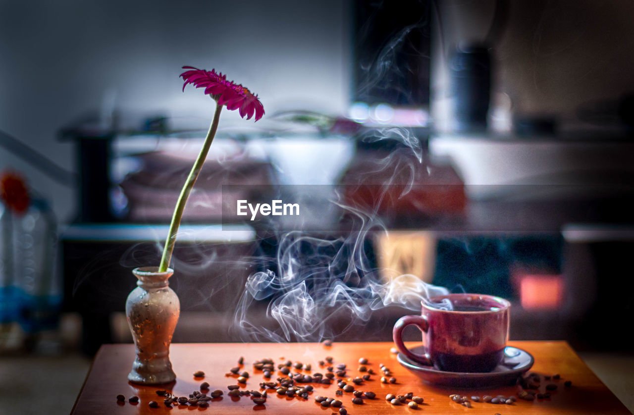 CLOSE-UP OF COFFEE SERVED ON TABLE AT HOME