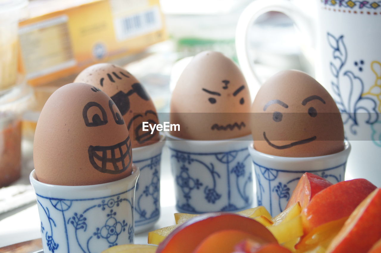 Close-up of eggs with anthropomorphic face