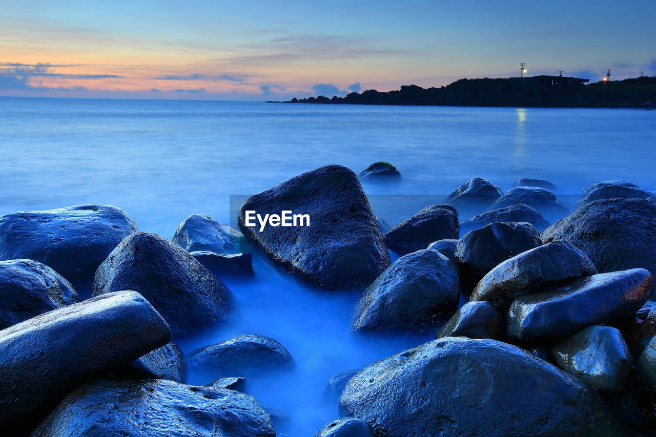 Panoramic view of sea against sky during sunset