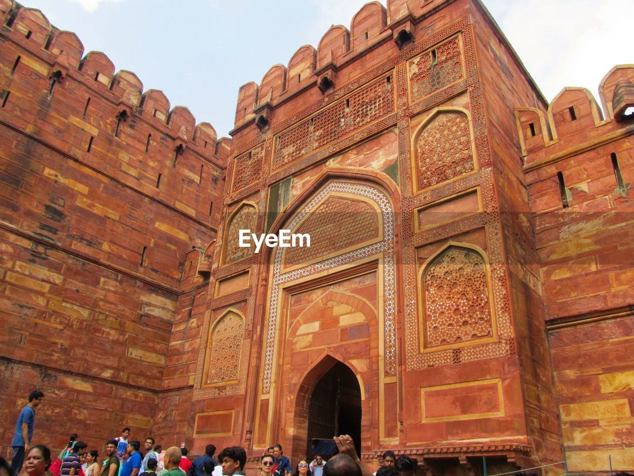 People at entrance of agra fort