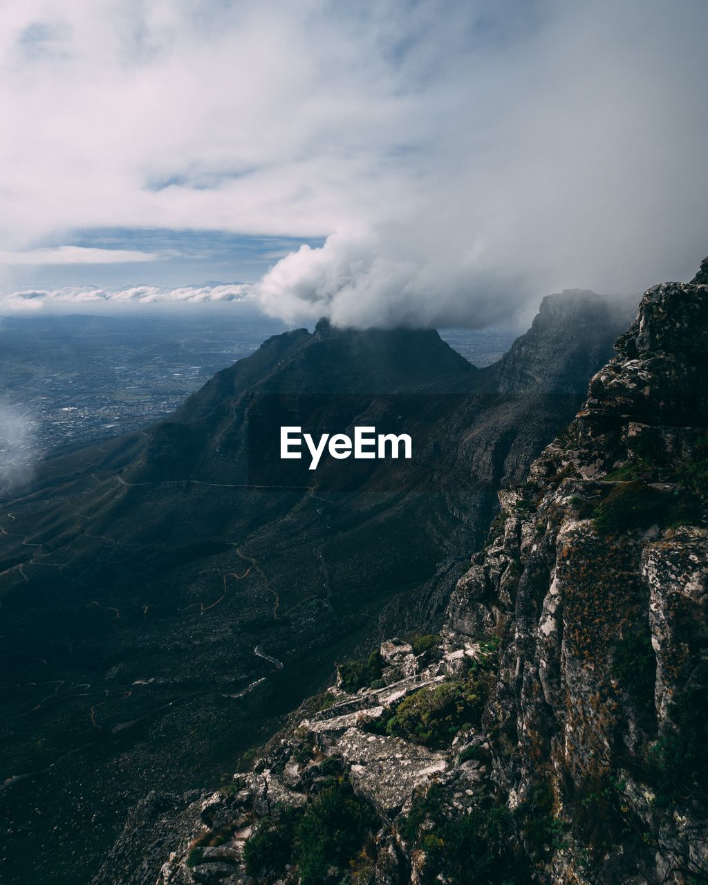 Aerial view of landscape and mountains against sky