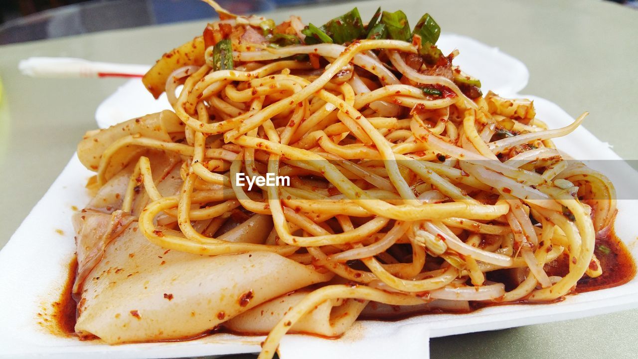 Close-up of spaghetti served on plate