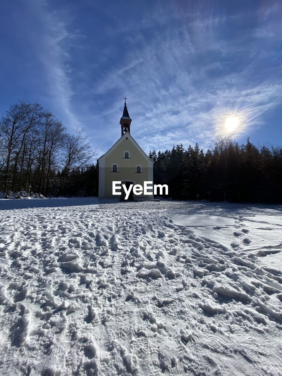 White building against sky during winter