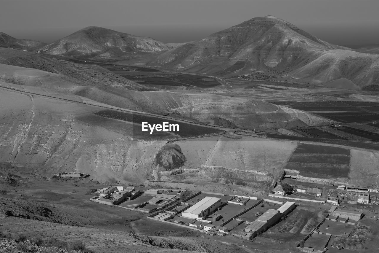 High angle view of land and mountains