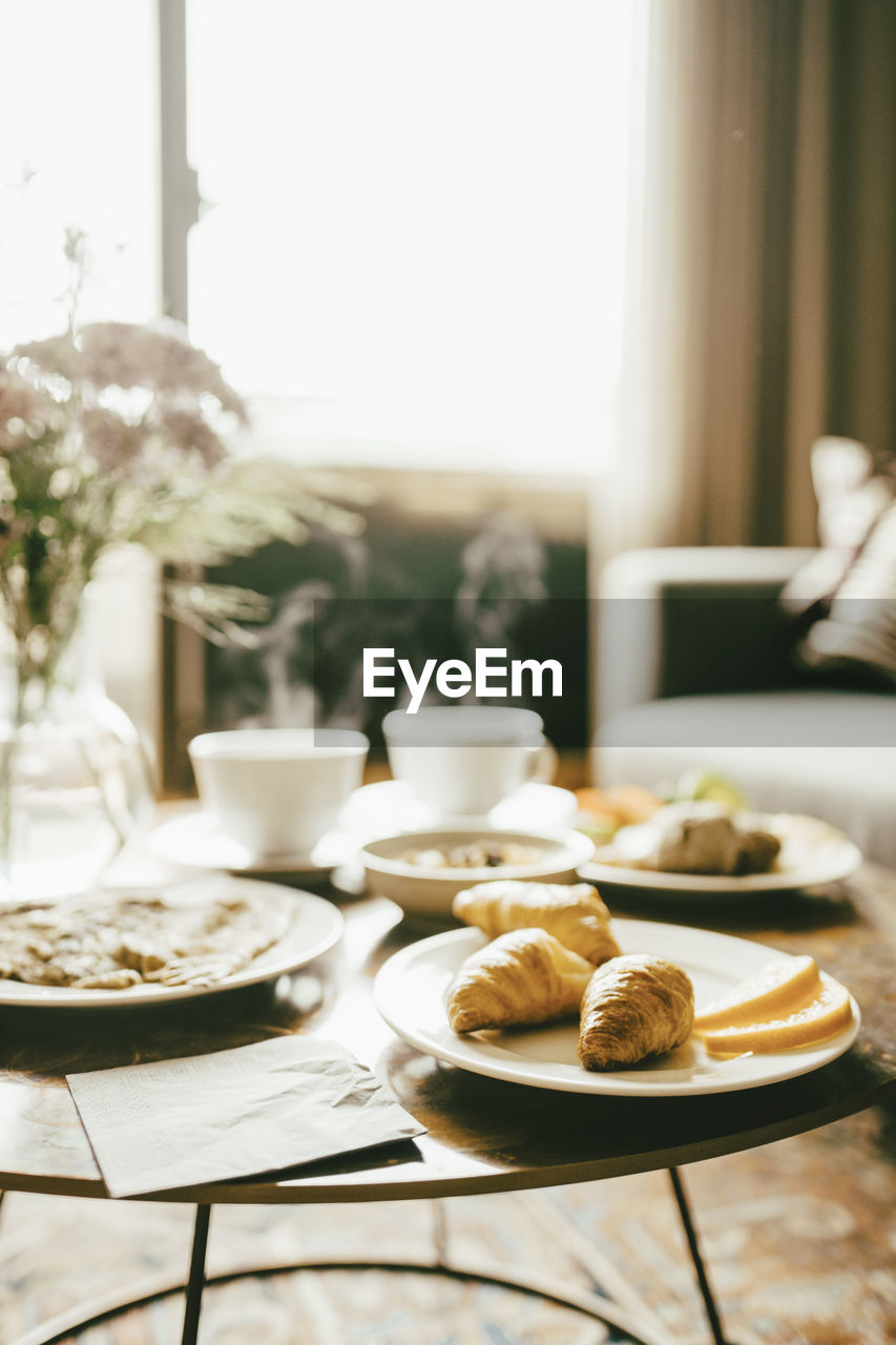 Fresh breakfast served on table in hotel room