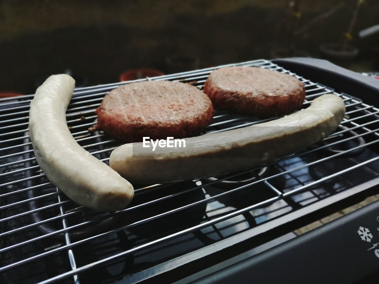 CLOSE-UP OF MEAT IN CONTAINER