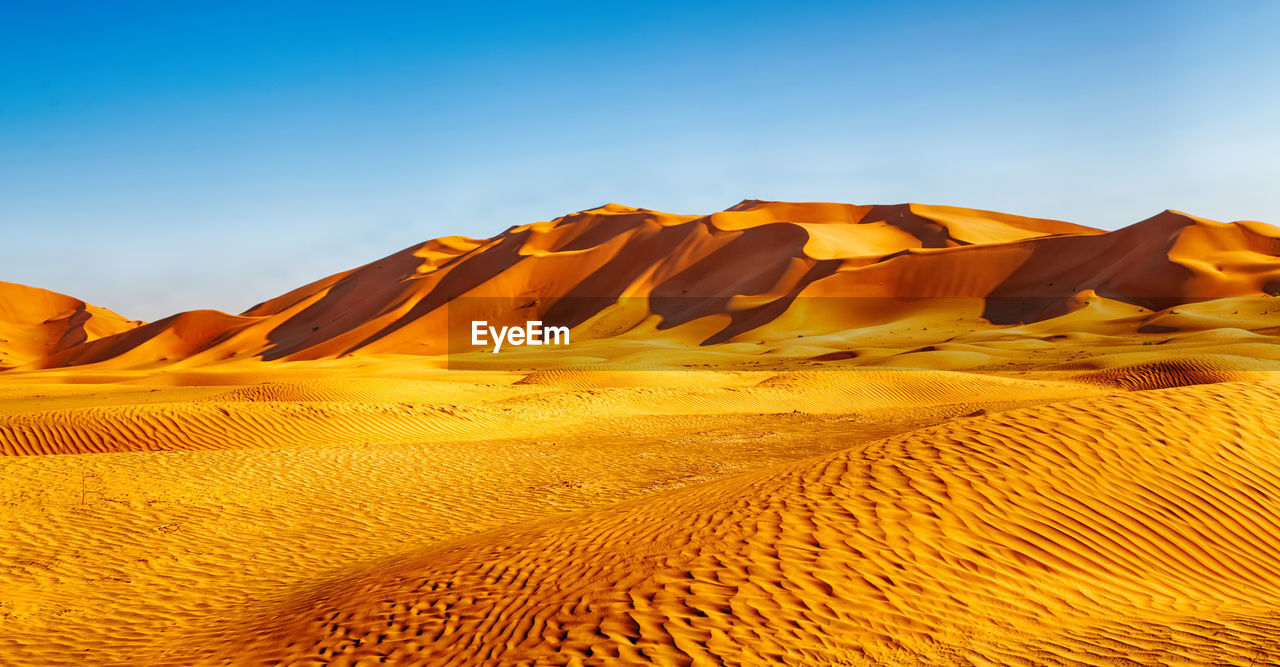 SCENIC VIEW OF DESERT AGAINST SKY