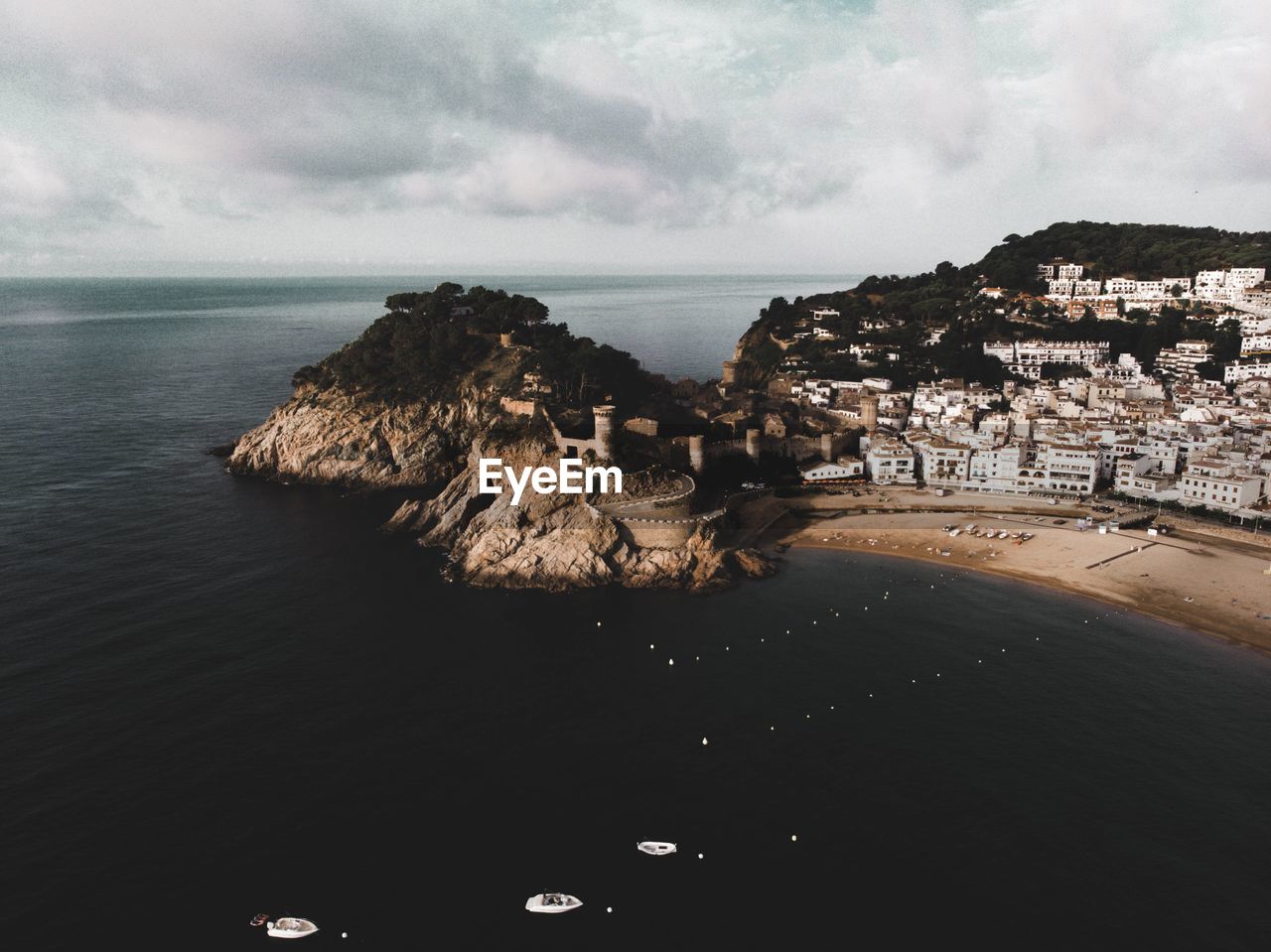 Scenic view of tossa de mar castle against sky