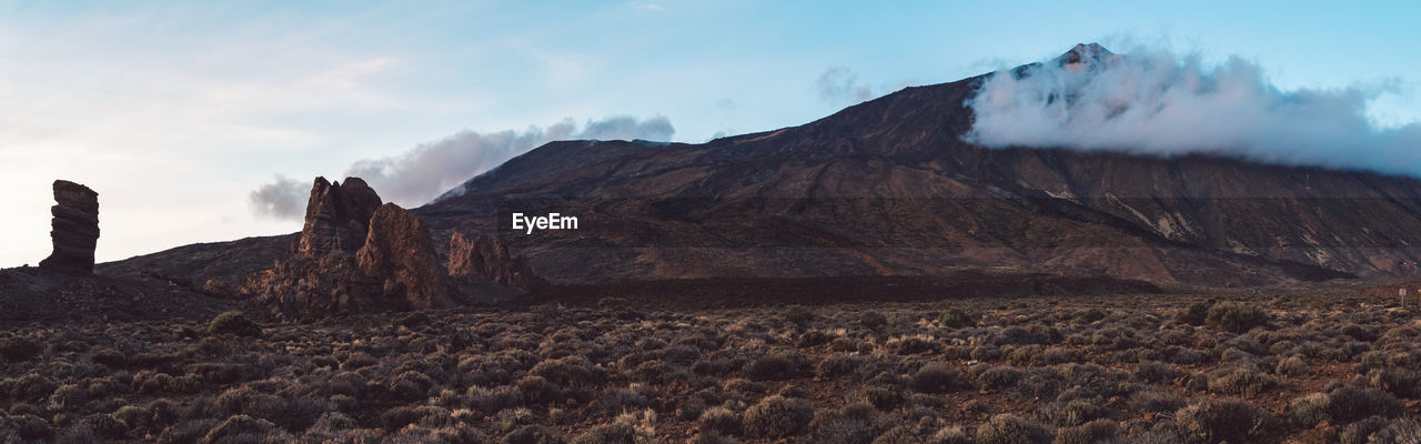 Panoramic view of landscape and mountains against sky