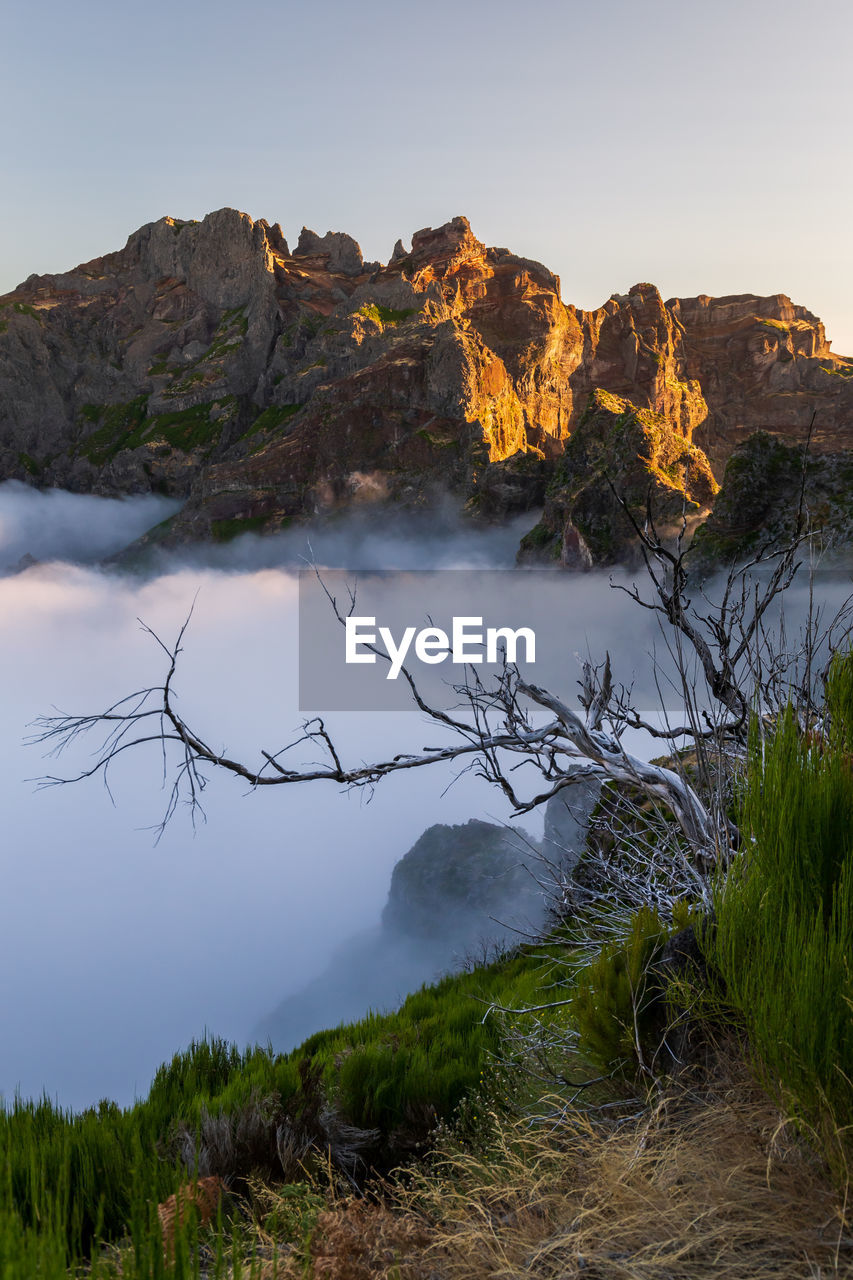 SCENIC VIEW OF ROCK FORMATION AGAINST SKY